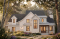 Vue avant - MODÈLE DE BASE - Plan de maison Tudor d’inspiration anglaise avec garage double et jusqu’à 5 chambres - Eugene