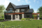 Version couleur no. 1 - Vue avant - Modèle de maison Scandinave 3 à 4 chambres, balcon chambre parents, terrasse arrière abritée - Azalée