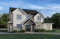 Vue avant - MODÈLE DE BASE - Maison à deux étages avec 5 chambres, une salle de jeux et des espaces familiaux lumineux et accueillants - Sunny Creek
