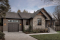 Vue avant - MODÈLE DE BASE - Plan de maison plain-pied avec garage et 2 chambres, salle de lavage au rez-de-chaussée, vestibule fermé - Aspen Creek 2