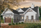 Version couleur no. 1 - Vue avant - Plan de maison 2 chambres, 2 s. bain, suite des maîtres, grand vestiaire, bungalow style farmhouse avec garage - Frangelica 3