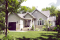 Vue avant - MODÈLE DE BASE - Bungalow champêtre lumineux à aire ouverte avec garage – Plan idéal pour confort et simplicité - Sylvestre 