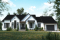 Vue avant - MODÈLE DE BASE - Modèle de maison farmhouse moderne plain-pied, 3 chambres, garage, conçu pour Ludovick Bourgeois - Maple Way 2