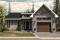 Vue avant - MODÈLE DE BASE - Plan de maison nordique 2 chambres, avec garage, garde-manger, vestiaire, chute à linge - Urban Valley 3
