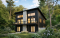 Vue arrière - MODÈLE DE BASE - Plan de chalet rustique avec rez-de-jardin, foyer STÛV et jusqu'à 4 chambres - Dahilia 2