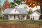 Vue avant - MODÈLE DE BASE - Plan de maison champêtre sur dalle, plain-pied de 3 chambres, abri moustiquaire - Country Cottage
