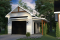 Vue avant - MODÈLE DE BASE - Modèle de garage farmhouse 320 pi² avec appentis de rangement et dalle flottante, compact et polyvalent - Simsbury