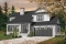 Version couleur no. 1 - Vue avant - Plan de maison 3 chambres, garage double, style Craftsman, foyer central, garage double, buanderie au premier - Dennison