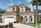 Vue avant - MODÈLE DE BASE - Maison style Floride, 4 à 5 chambres, garage double, îlot cuisine, grand séjour - Lana
