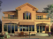 Vue arrière - MODÈLE DE BASE - Plan de maison style Floride, 4 grandes chambres, solarium, plafond 9', 2 balcons, garage - La Jolla 2