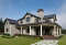 Vue avant - MODÈLE DE BASE - Plan de maison panoramique, galerie abritée sur 3 faces, garage double, terrasse aux maîtres, 3 chambres. - Meridian 2